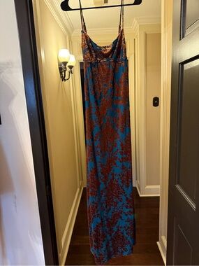Teal velvet maxi dress with floral detailing